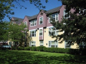 a house with a yard in front of it